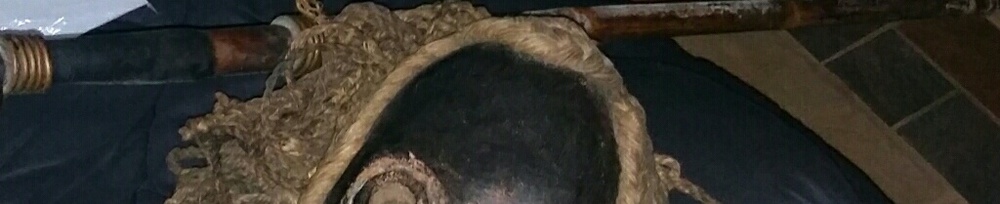 Africa handmade wooden mask with yarn hair